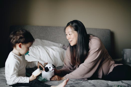 toddler playing with puppy